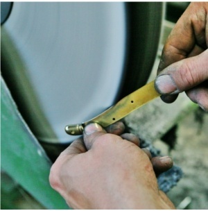 dismantling the handle and polishing platens